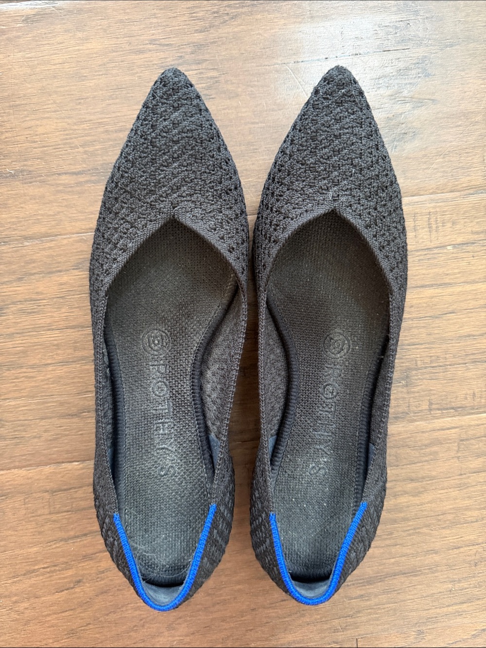 Rothy's Black Pointed Knit Flats with Blue Heel Accent